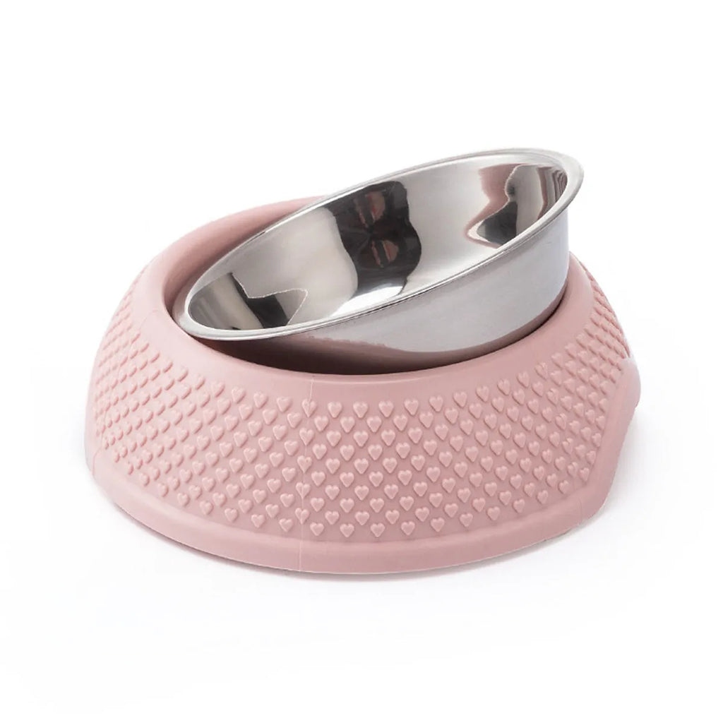 Blue stainless steel pet bowl with non-slip base on a table
