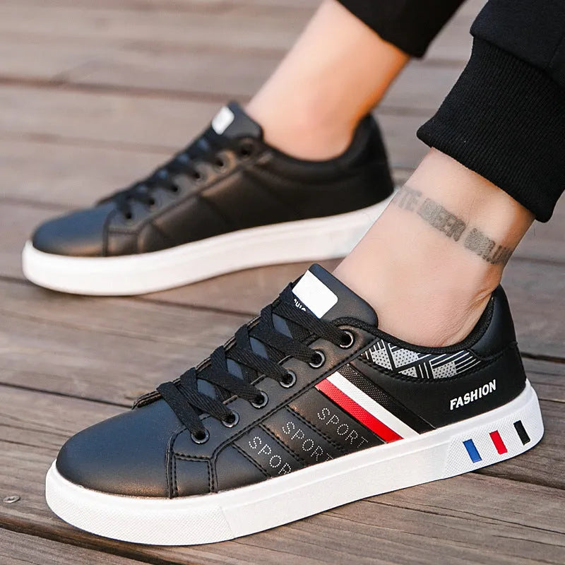 Unisex black, grey and white sports shoes with lace-up front in EU sizes 39 to 44