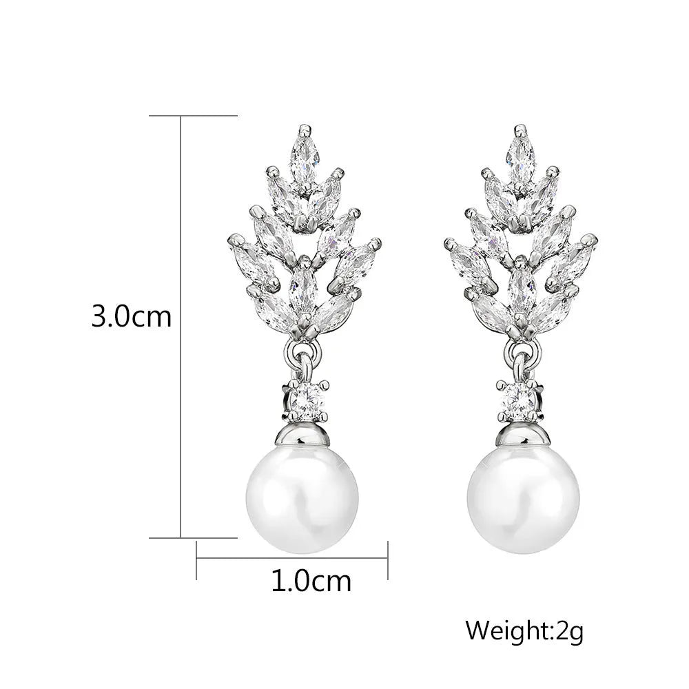 Geometric earrings with micro zircon stones and flower design in gold, platinum or rose gold plating