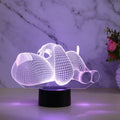 Doggo Desktop Lamp showing 3D illusion dog design with multi-colour illumination