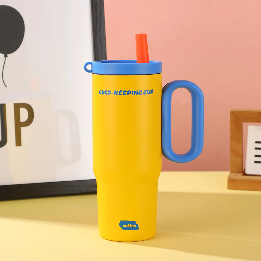 Large insulated plastic straw cup with a carry handle and lid, shown in assorted colours.