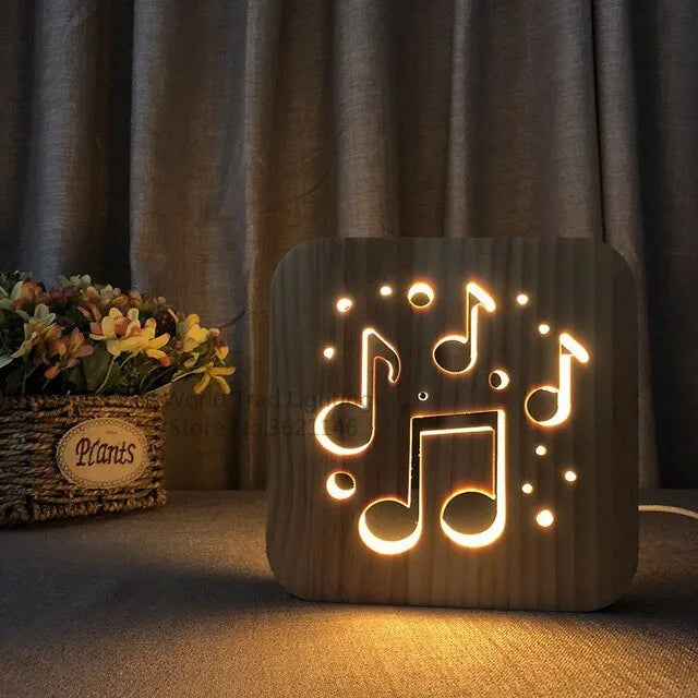 Square pine wood LED atmosphere lamp with warm white 3D illumination showing USB cable connection