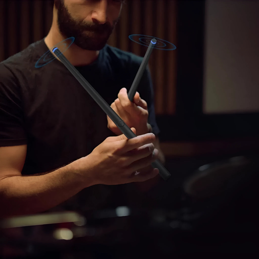 Black somatosensory air drum kit virtual toy with two drumsticks and LED lighting on a wireless base