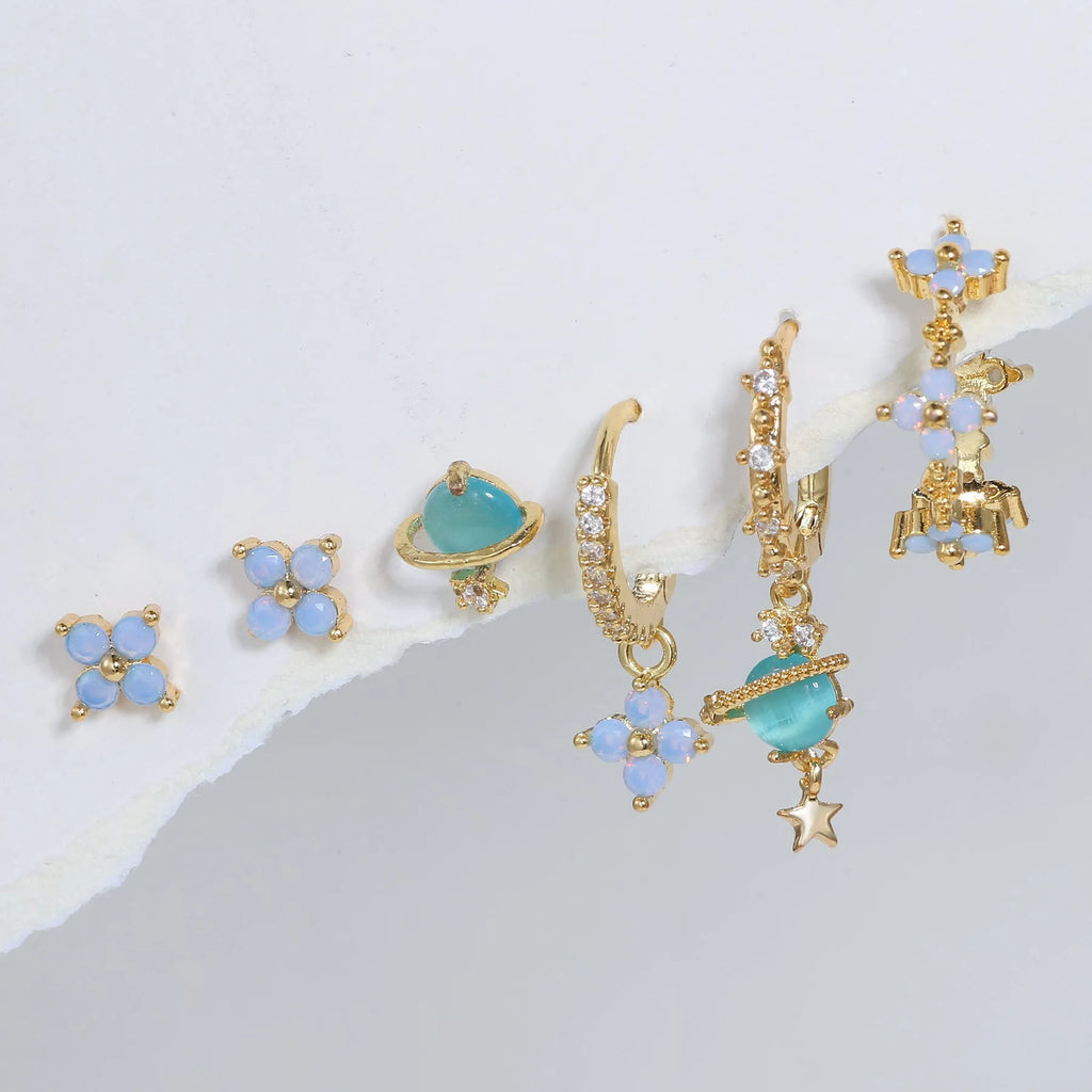 Gold and silver floral stud earrings with blue protein stone mosaic design.