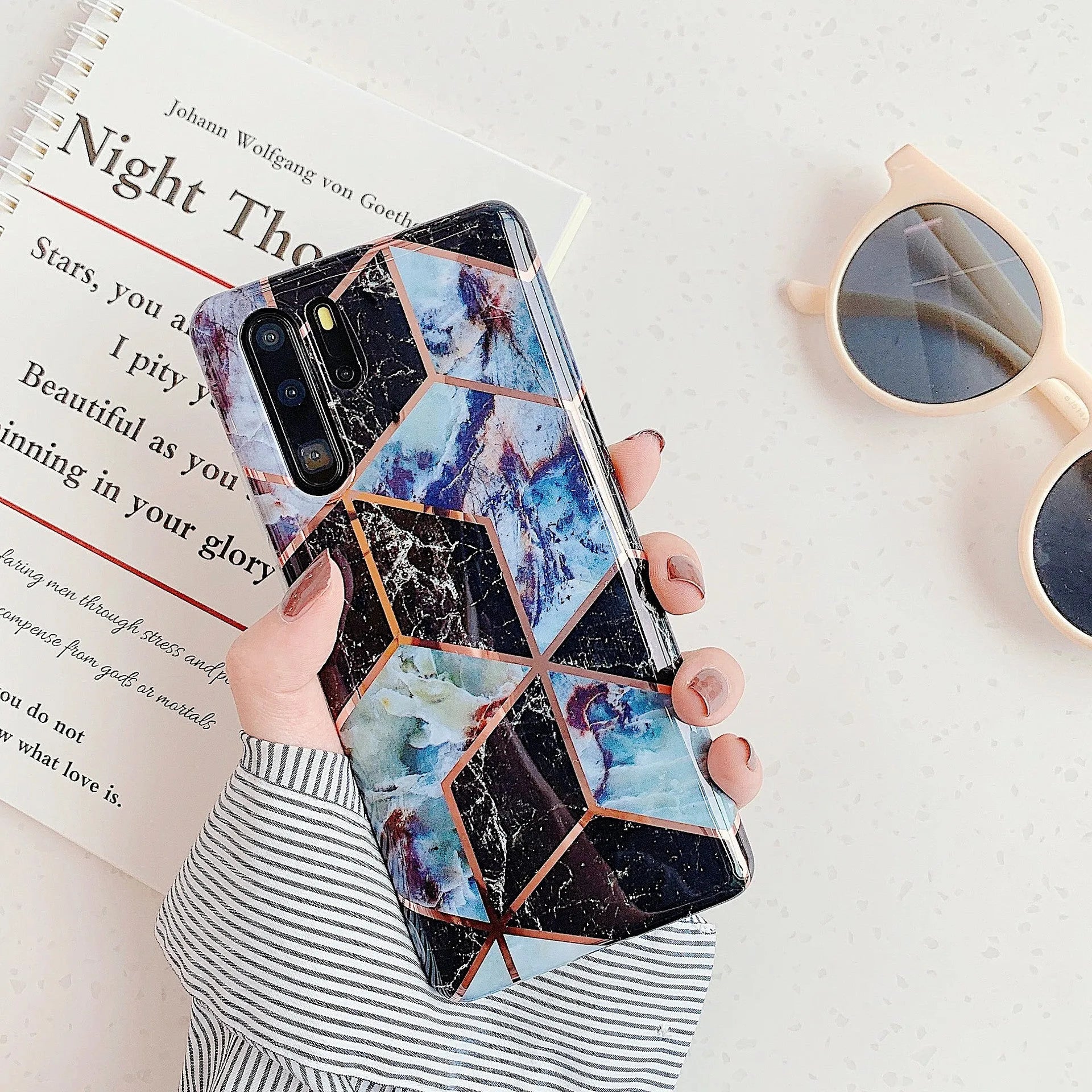 Electroplated marble finish TPU back cover case for Huawei and Samsung smartphones in multiple colours.