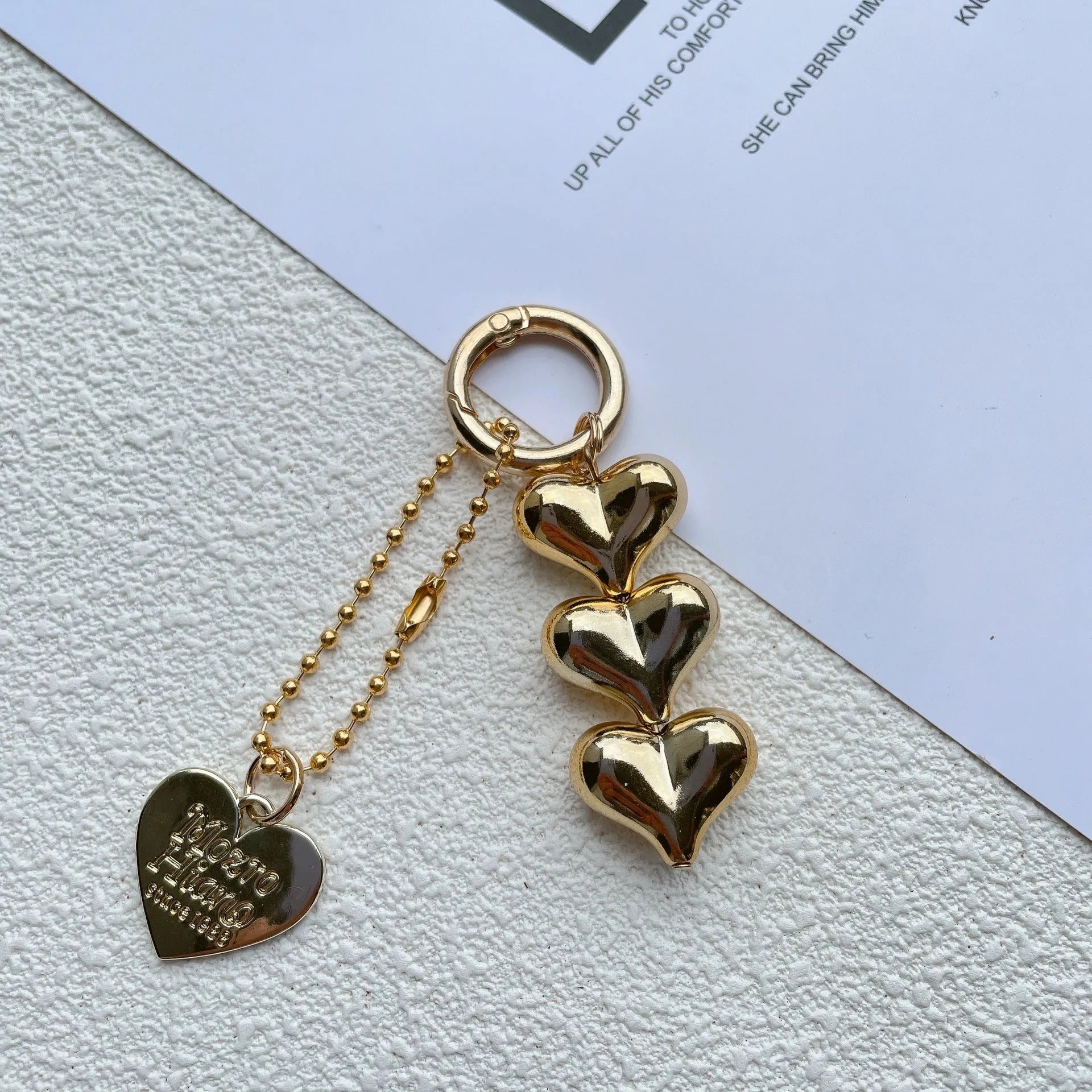 Fart Peach Love electroplated acrylic key ring with heart pattern in black, gold or white