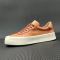Men's white cowhide platform board shoes with thick rubber sole and round toe design