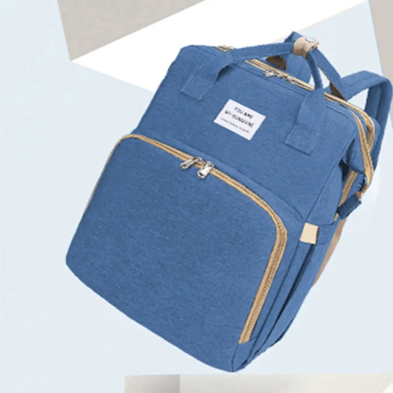 Portable lightweight nylon folding baby changing bag with USB port and shoulder strap in selected colour.