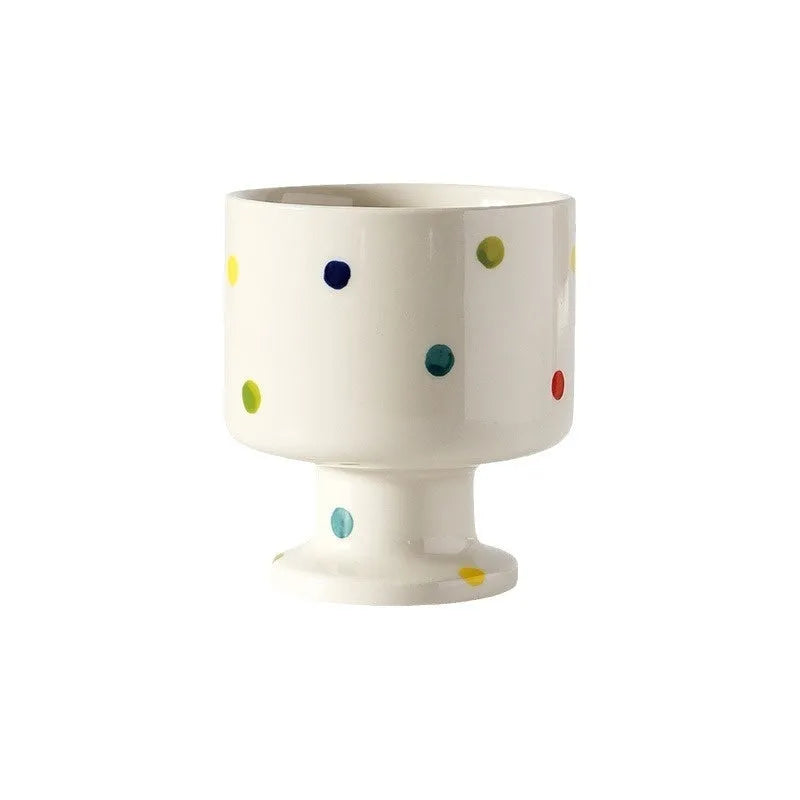 Hand-pinched irregular ceramic mug in solid colour, approximately 250ml capacity