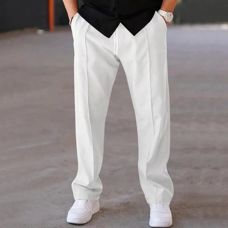 Men's loose straight drawstring trousers in waffle polyester fabric, shown in multiple colour options