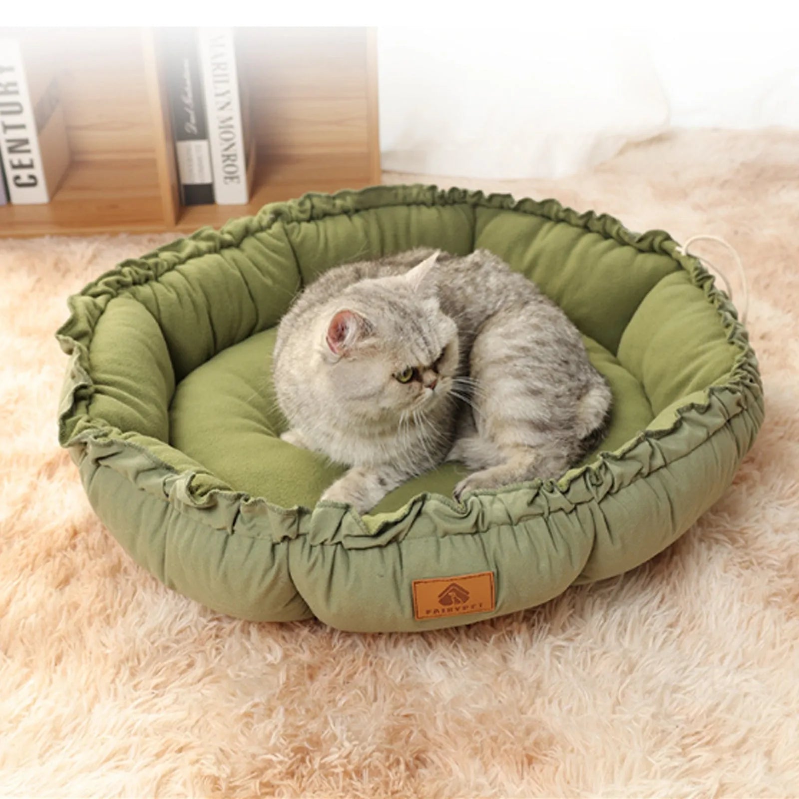 Grey and green reversible donut-shaped cat bed for indoor pets