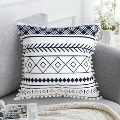 Bohemian style throw pillow on a sofa, available in light grey, black, or white, shown in 45x45cm size.