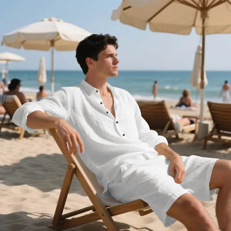 Linen long sleeve shirt and matching shorts beach set in light blue, laid flat.