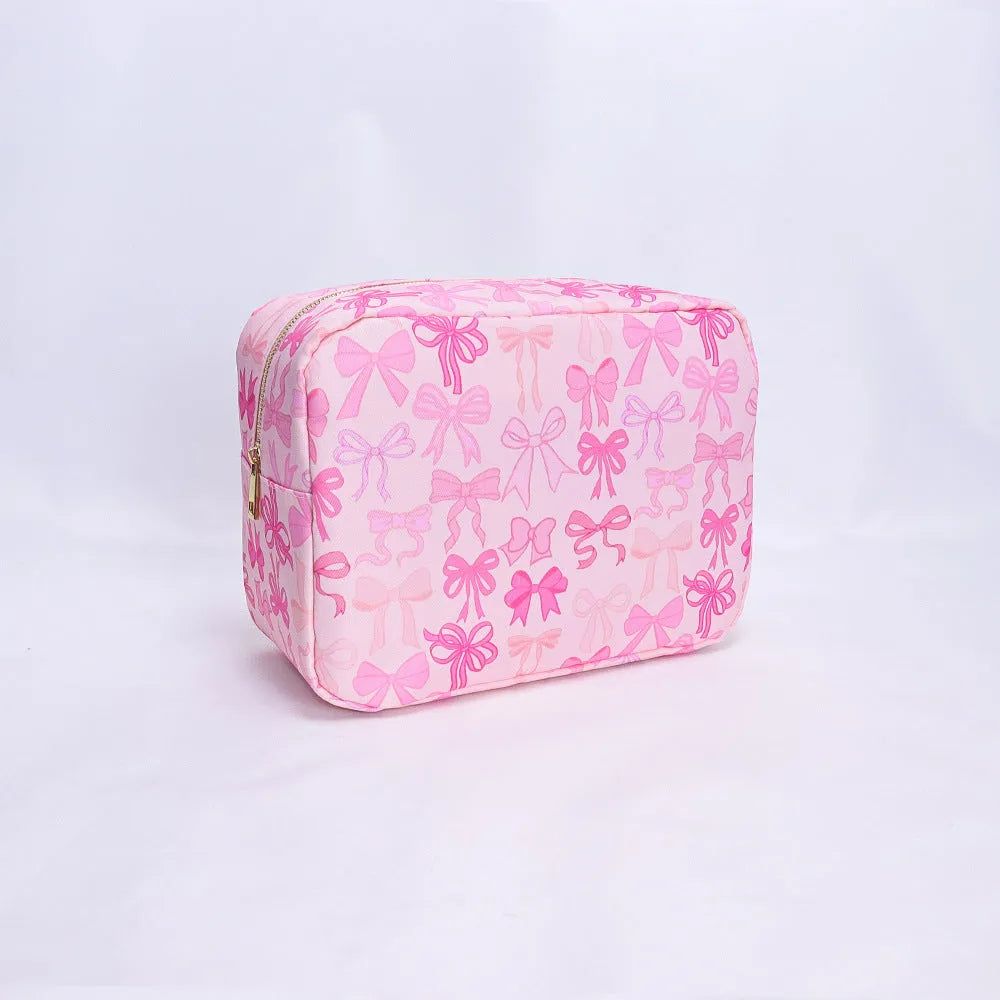 Printed nylon cosmetic bag in blue with cartoon animation pattern, travel storage pouch