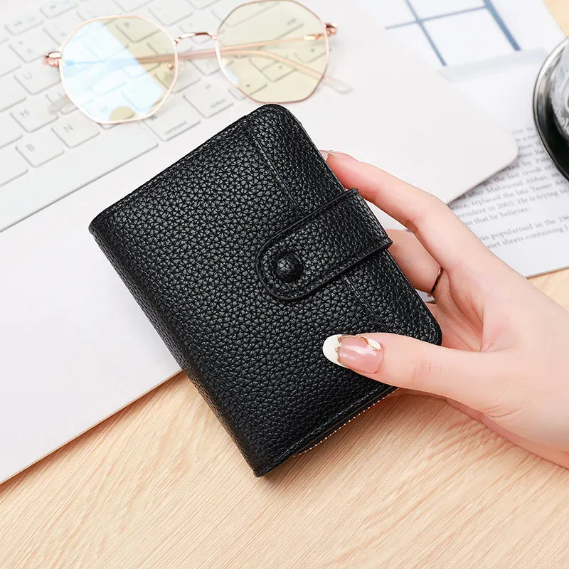 Ladies short wallet with lychee pattern texture in PU leather showing 2-fold design