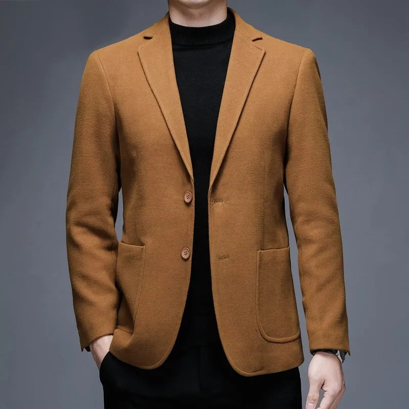 Men's solid colour loose fit winter jacket in grey, shown with long sleeves and round hem.