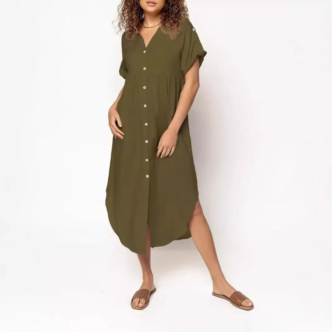 Loose-fitting casual solid colour button dress in a mid-length style on a hanger.