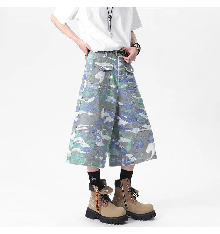 Cropped camouflage colour denim work trousers with straight leg and zipper fly on a mannequin