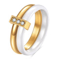 Steel black ceramic women's ring with glossy stitching and zirconium accents, geometric shape.