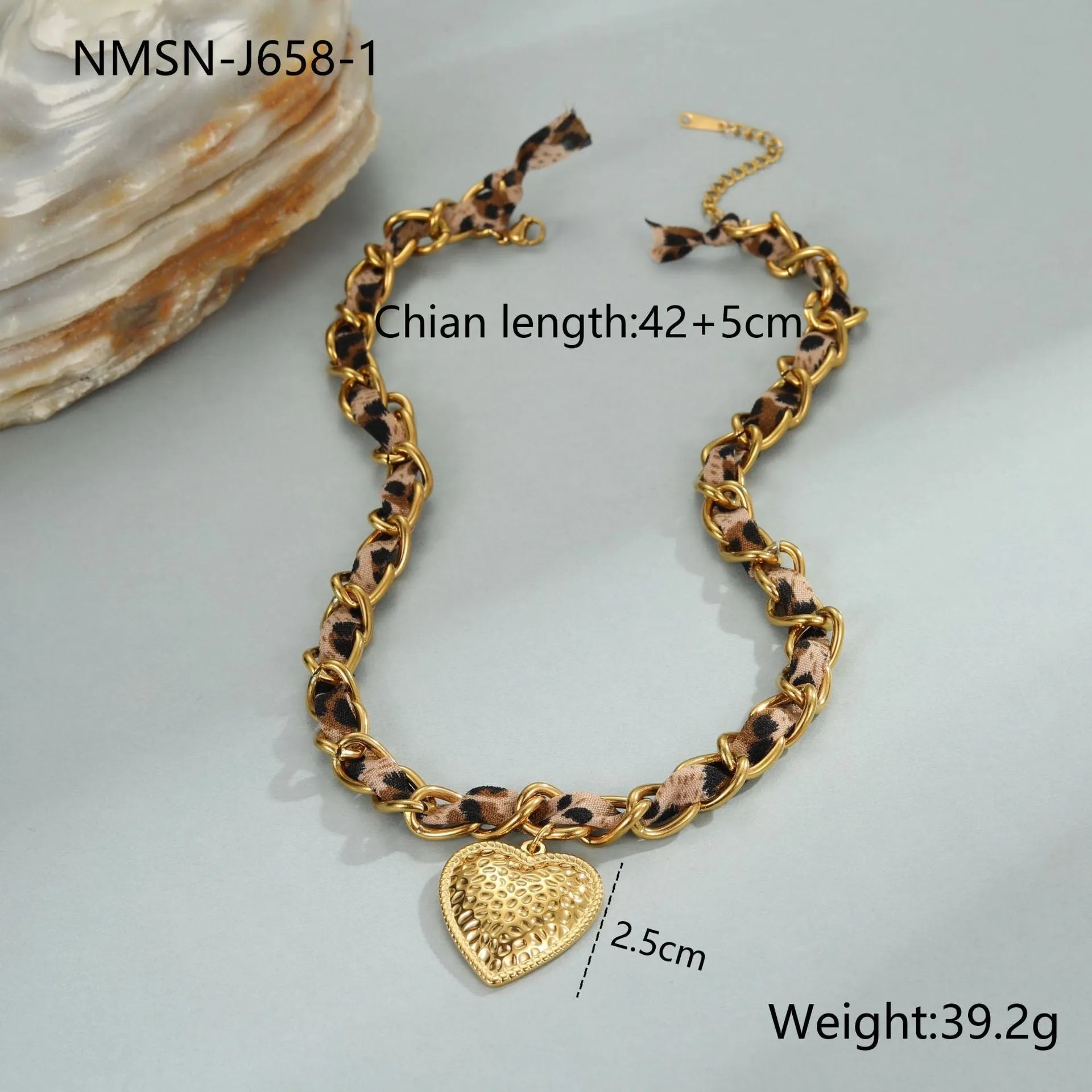Leopard Love stainless steel necklace with 18K gold plating, showing geometric Big Heart or Love Sun pendant on an adjustable chain.