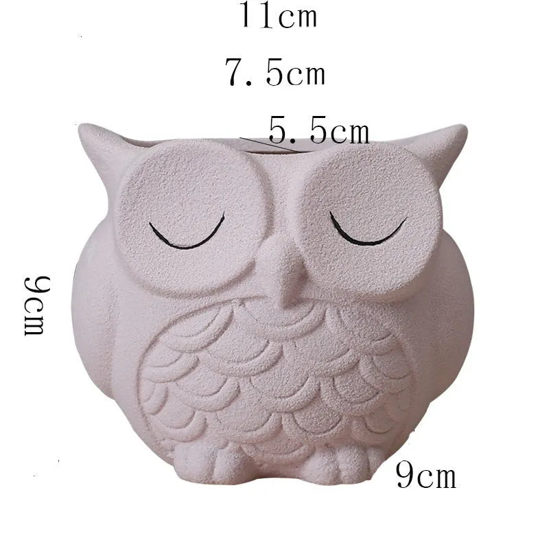 Handmade frosted ceramic flower pot with a cartoon owl design for small succulents.