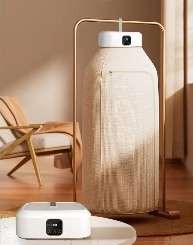 White cylindrical compact laundry dryer with remote control for dormitory use