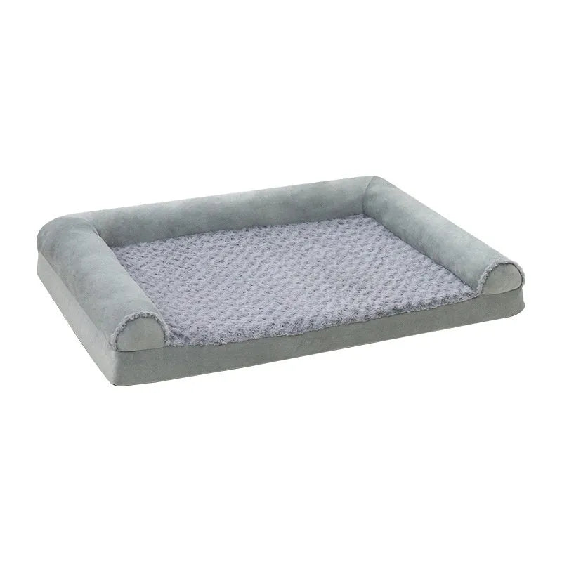 Light grey soft cloth dog kennel with removable mat, shown in a home setting.