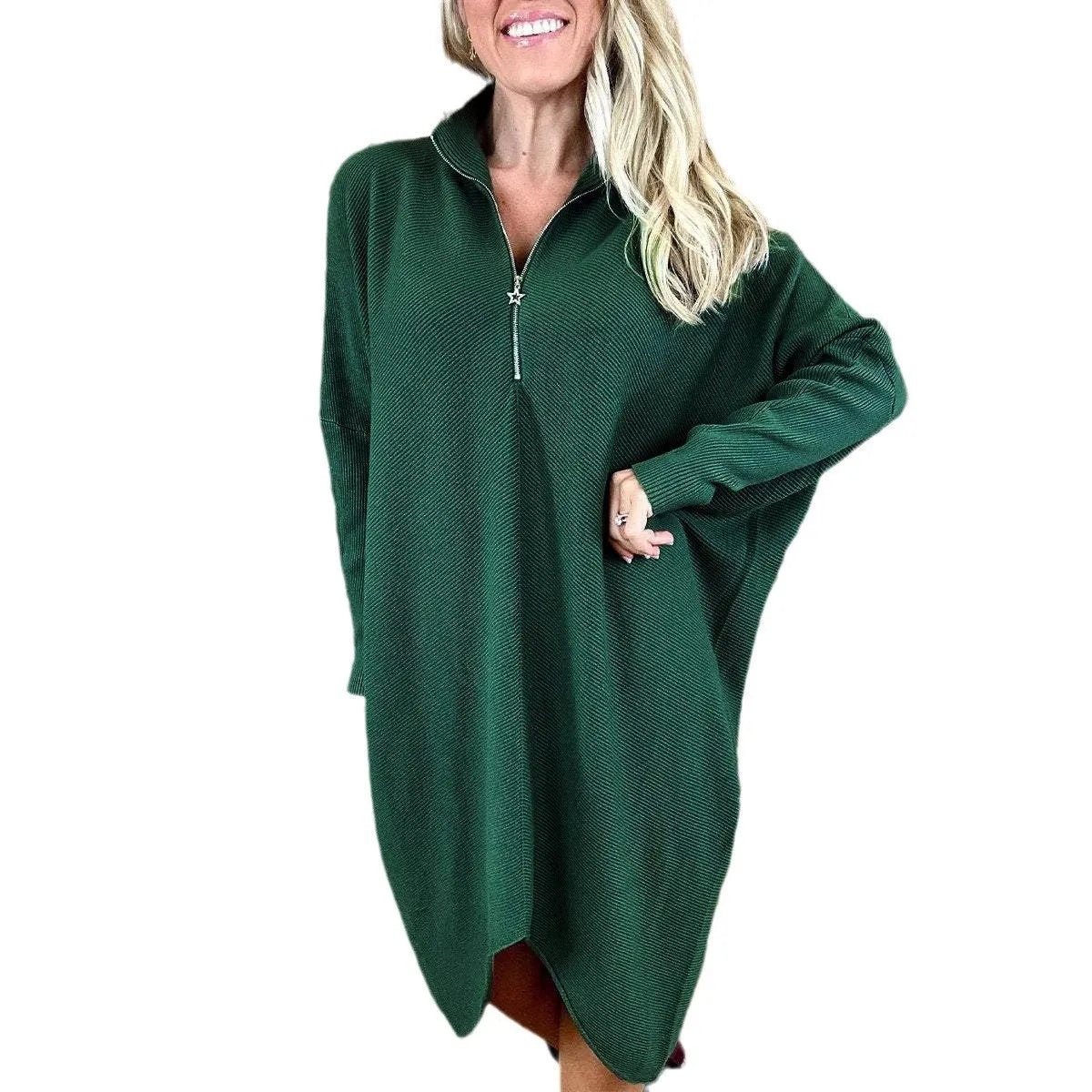 Women's solid colour loose knitted dress with raglan sleeves and a zipper detail.