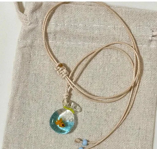 Women's necklace with a coloured glaze Small Fish Lucky Bag pendant on a cotton and linen clavicle chain.