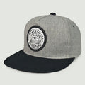 Adjustable cotton twill baseball cap in black with big flat eaves and monochrome letter detail
