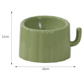 Solid colour raised cat bowl with cactus design, anti-slip base, and large mouth opening in dark green