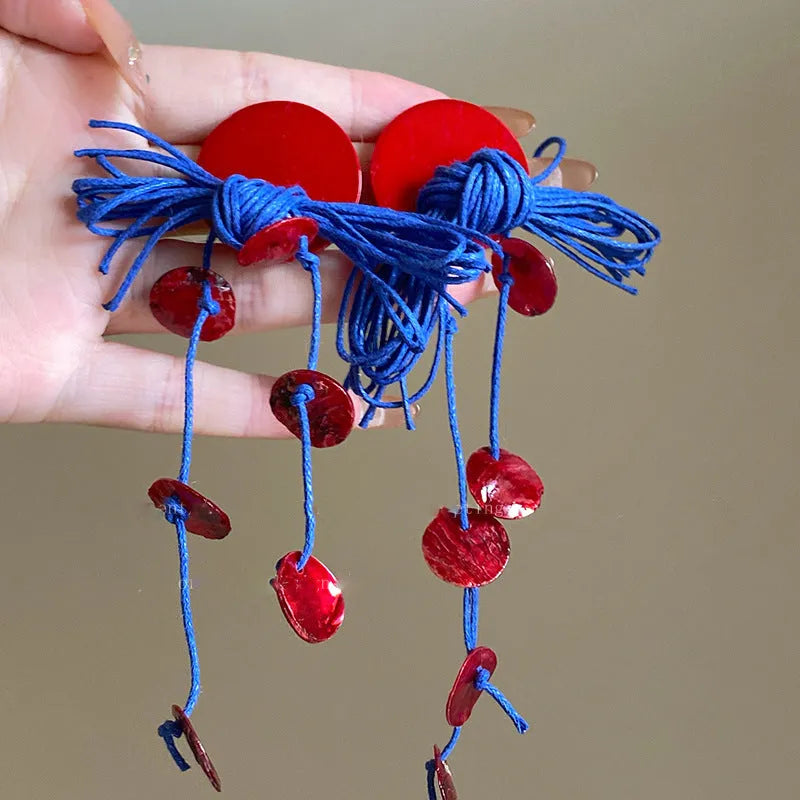 Handmade geometric blue resin flower cloth earrings for women on a silver needle base.