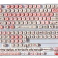 Pink sculpted fragrant pig PBT keycap with colourful five-sided sublimation design for mechanical keyboards.