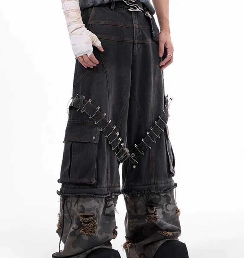 Men's grey jeans with camouflage pattern splicing and decorative pin and ribbon details on cotton denim