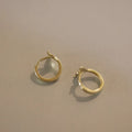 Gold plated fishtail hoop earrings made from sterling silver, showing 8mm inner diameter