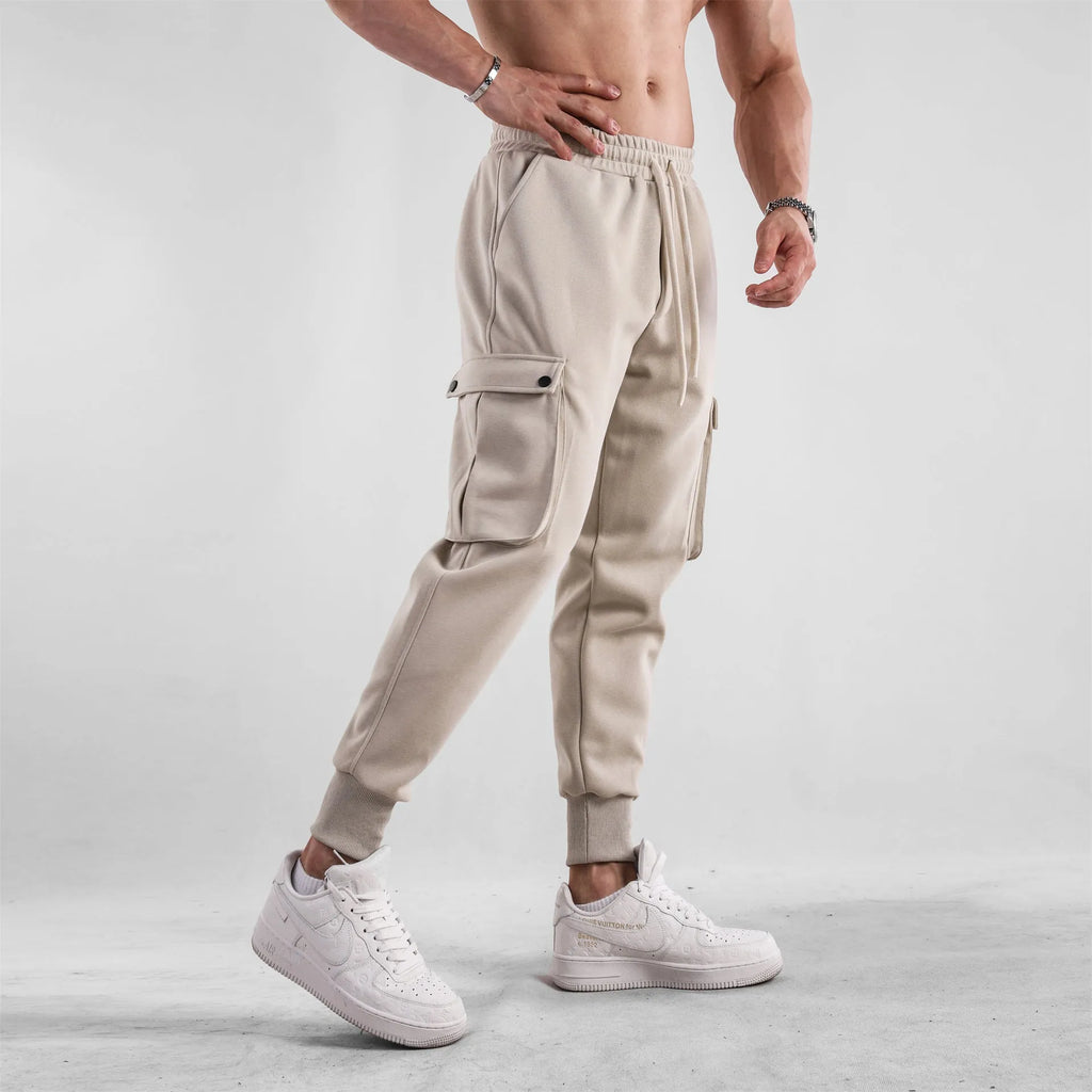 Men's loose cotton sports trousers with ankle ties and multiple pockets in various colour options