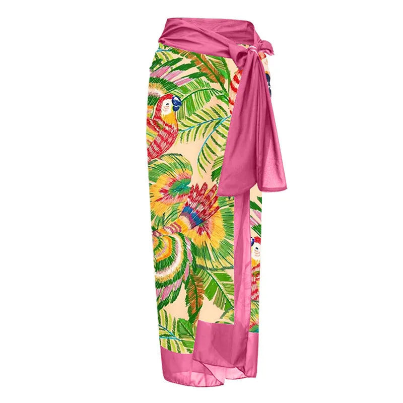 Pink floral print women's V-neck one-piece swimsuit with an attached skirt cover