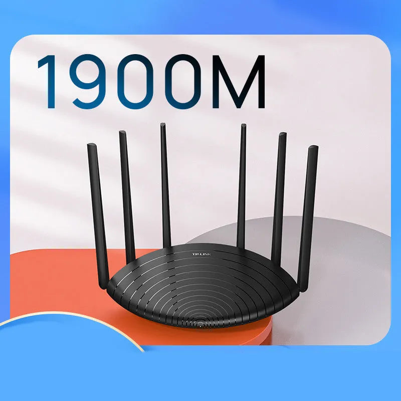 TP-Link TL-WDR7661 AC1900 Gigabit wireless router in black housing on a desk.