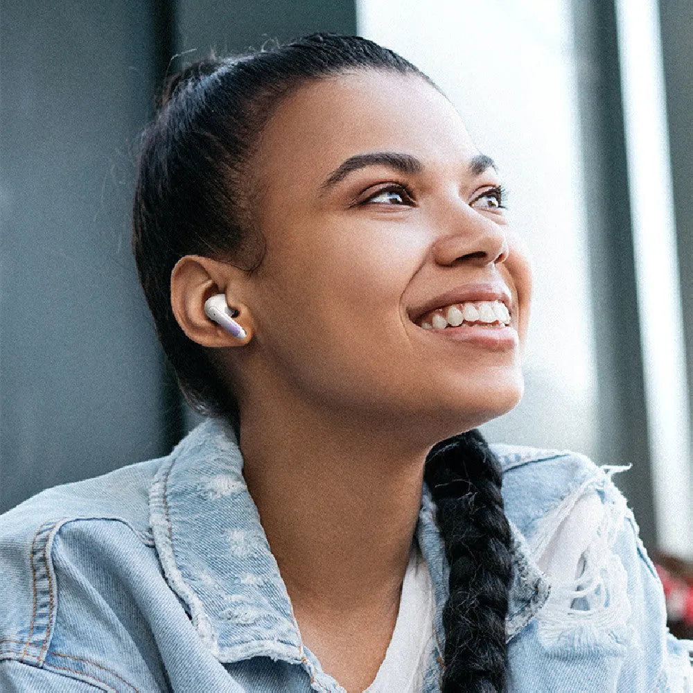 Wireless in-ear gaming headset in gradient blue colour showing earbud and charging case.