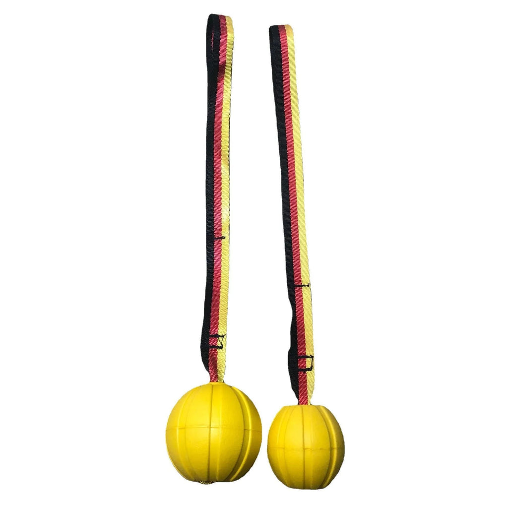 Yellow and camouflage coloured EVA foam floating dog tether balls in three different sizes on a blue background.