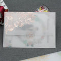 Gold bronzed sulfuric acid paper invitation card with matte finish measuring 12.5 by 17.6 centimetres