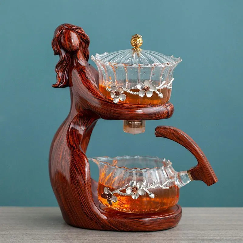 Maid semi-automatic tea set with borosilicate glass teapot, stainless steel filter, and Chinese-style woman sculpture base