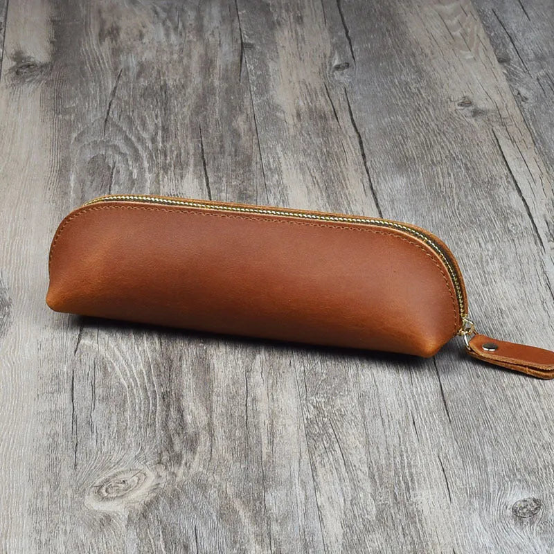 Handmade cowhide leather pencil case in rectangular shape with zipper closure