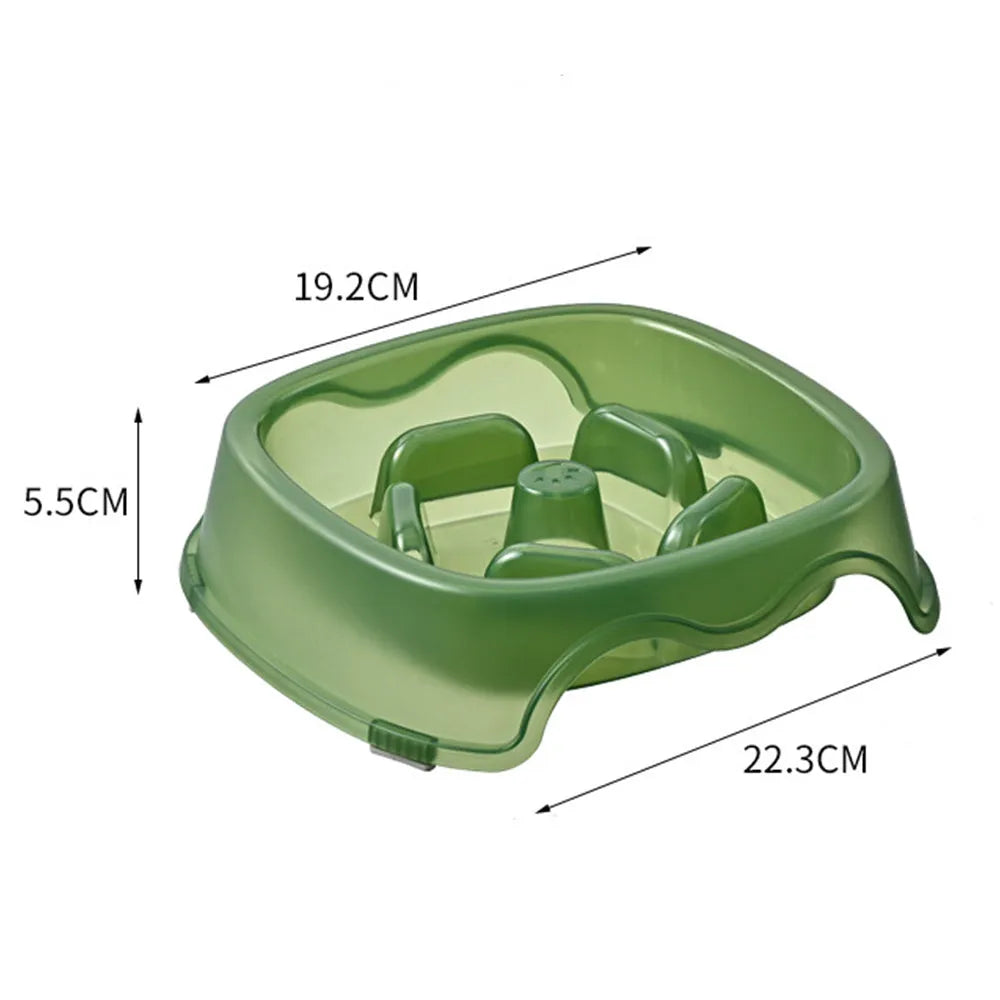 Blue plastic slow feeder dog bowl with anti-choking design on a white background