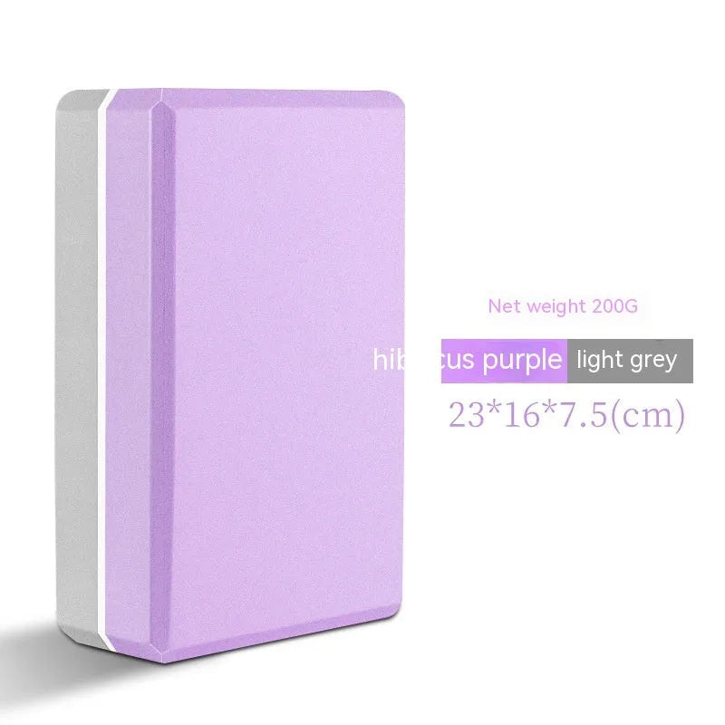 A high-density EVA yoga block in a choice of solid colours or printed designs, measuring 23cm by 15cm.