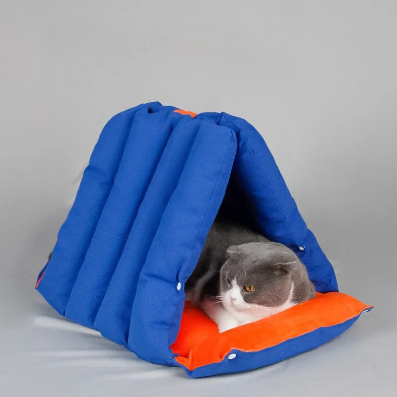 Triangular blue cat nest bed with removable cotton cover measuring 45x38x38cm