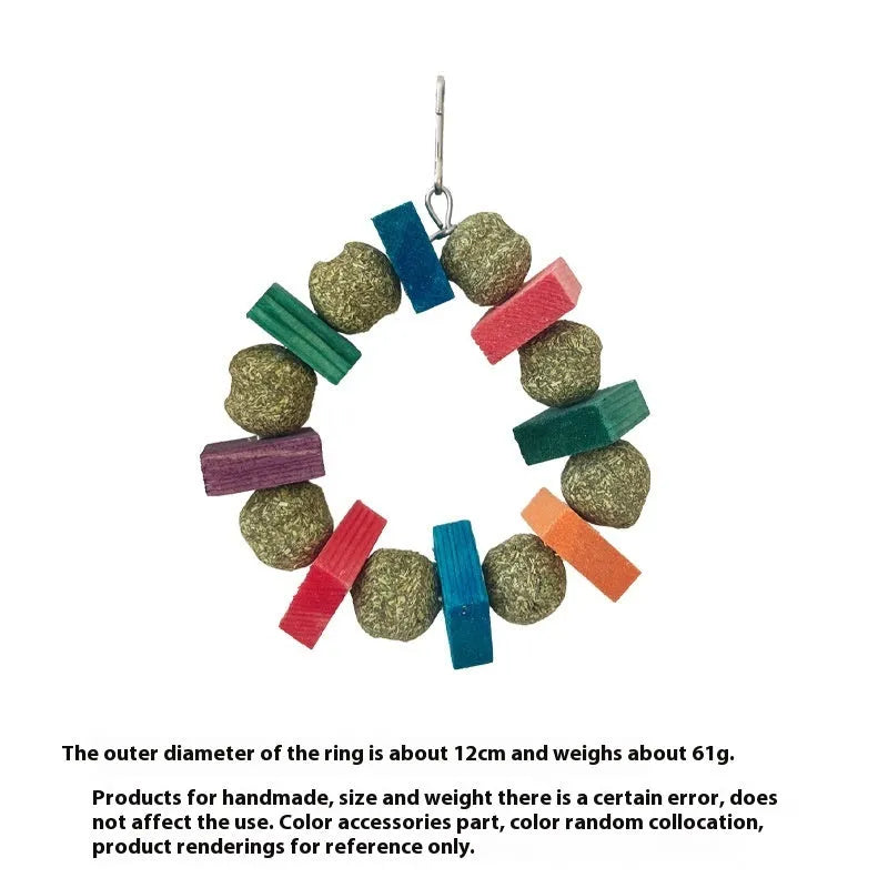 Hamster chew toy with straw ball and applewood ring components for small pets