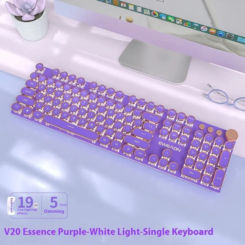 Matcha green mechanical gaming keyboard with multifunction knob on a desk