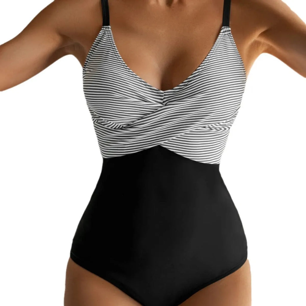 Women's printed bikini swimsuit showing lace-up back detail and gathered fabric in a floral pattern.