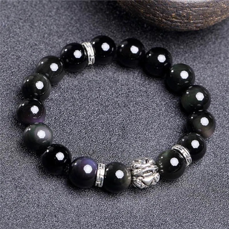 Obsidian bead bracelet with natural cloud patterns and a 999 silver clasp.